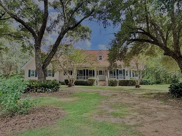 57.4 Acres of Land with Home for Sale in Carriere, Mississippi
