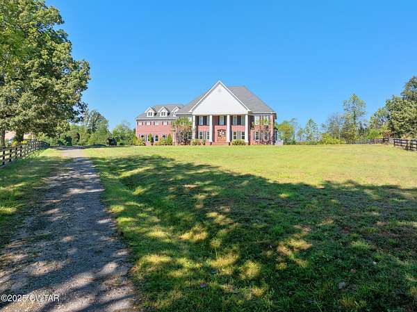 75 Acres of Agricultural Land with Home for Sale in Lavinia, Tennessee