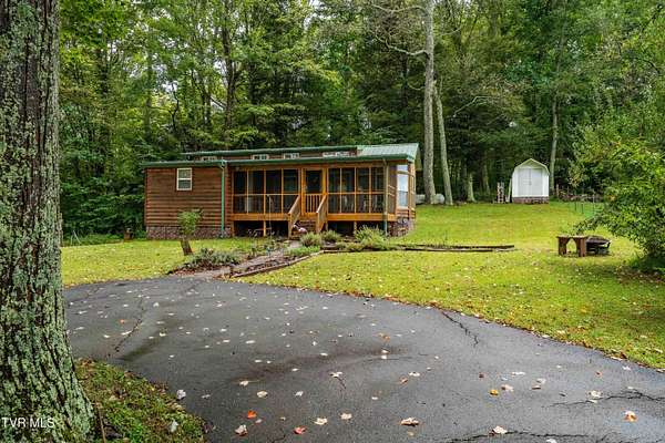 0.67 Acres of Residential Land with Home for Sale in Mountain City, Tennessee