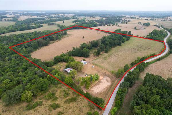 51 Acres of Land with Home for Sale in Aurora, Missouri