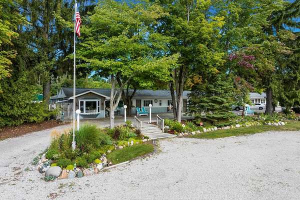 2.78 Acres of Land with Home for Sale in Eastport, Michigan