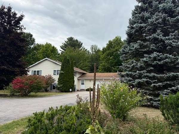 8.3 Acres of Residential Land with Home for Sale in Traverse City, Michigan