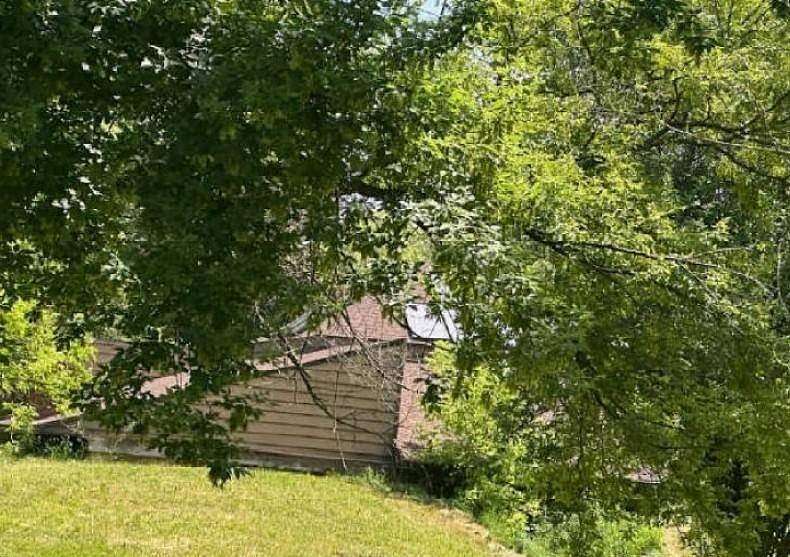 2 Acres of Residential Land with Home for Auction in Flint, Michigan