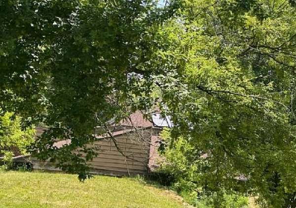 2 Acres of Residential Land with Home for Auction in Flint, Michigan