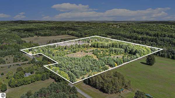 38 Acres of Land with Home for Sale in Bellaire, Michigan