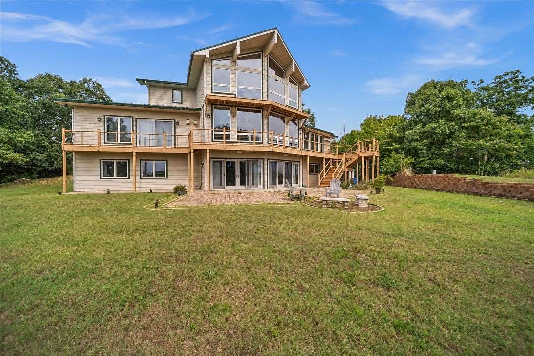 11 Acres of Land with Home for Sale in Garfield, Arkansas
