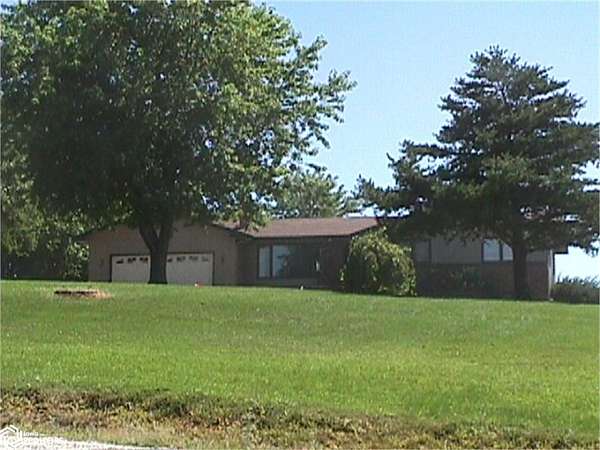 8.17 Acres of Residential Land with Home for Sale in Oskaloosa, Iowa