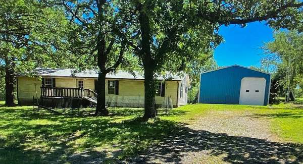 1.54 Acres of Residential Land with Home for Sale in Mounds, Oklahoma