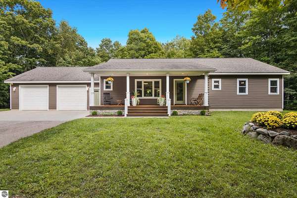 5.79 Acres of Residential Land with Home for Sale in Grawn, Michigan