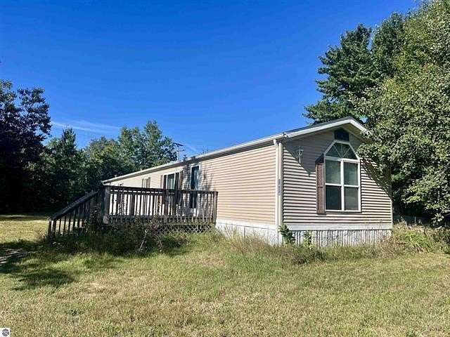 2 Acres of Land with Home for Sale in Lake City, Michigan