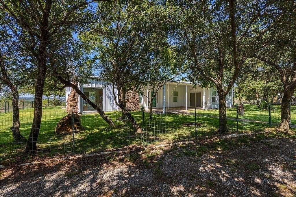 1.75 Acres of Residential Land with Home for Sale in Springtown, Texas