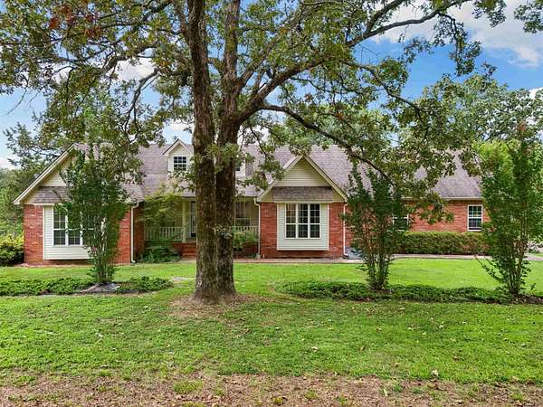 2.42 Acres of Residential Land with Home for Sale in Romance, Arkansas