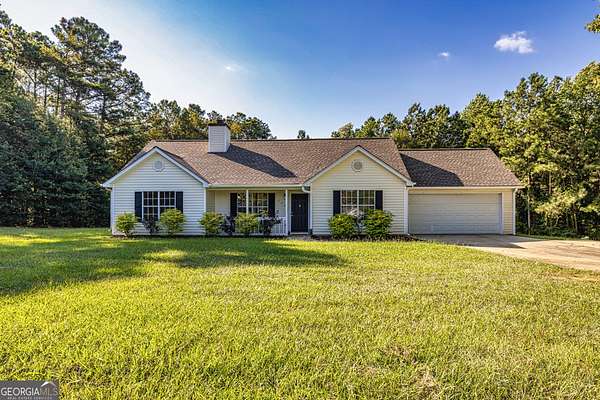 1.5 Acres of Residential Land with Home for Sale in Sharpsburg, Georgia