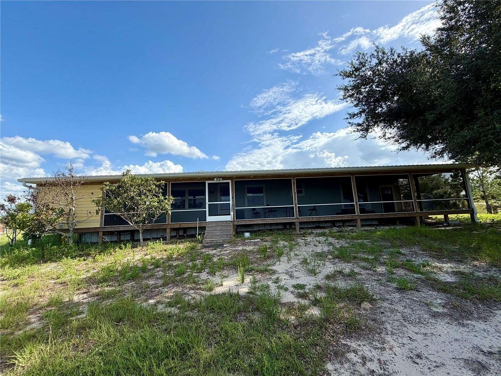 10 Acres of Land with Home for Sale in Babson Park, Florida
