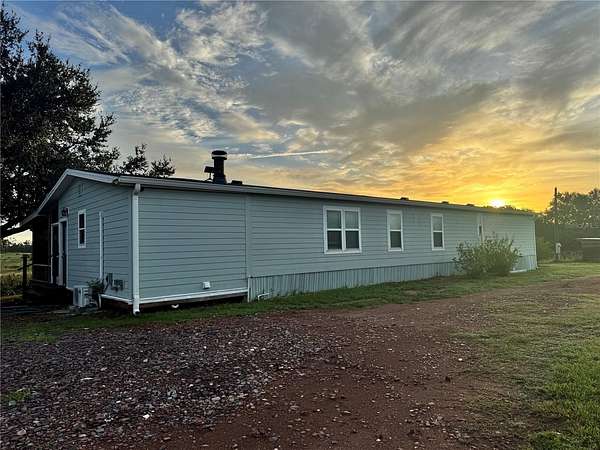 10 Acres of Land with Home for Sale in Babson Park, Florida