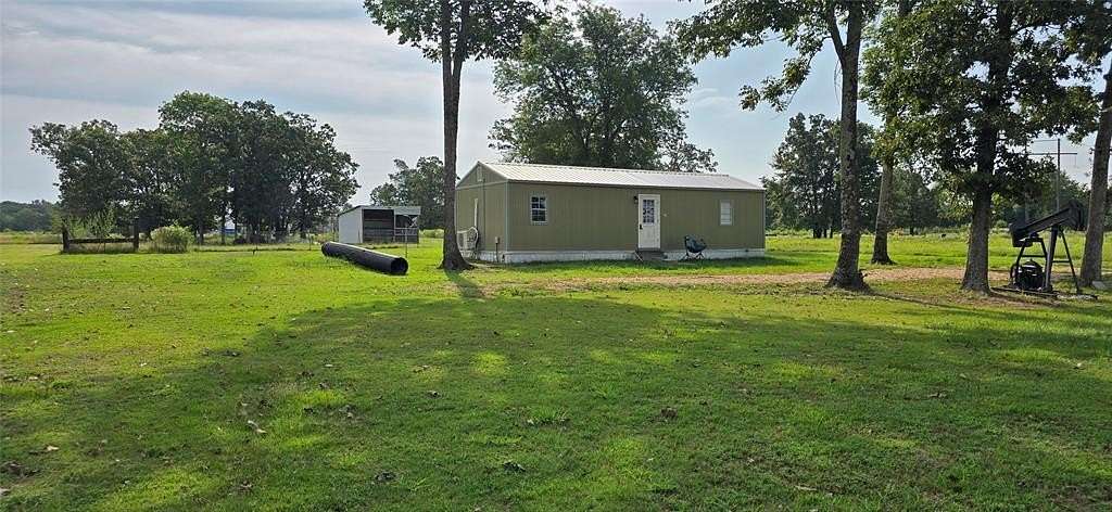 0.93 Acres of Residential Land with Home for Sale in Yantis, Texas