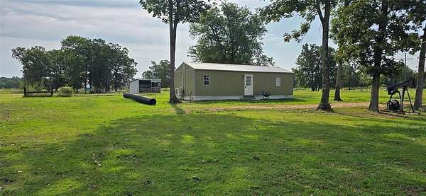 0.93 Acres of Residential Land with Home for Sale in Yantis, Texas