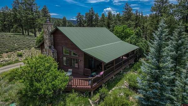 70.4 Acres of Land with Home for Sale in Pagosa Springs, Colorado