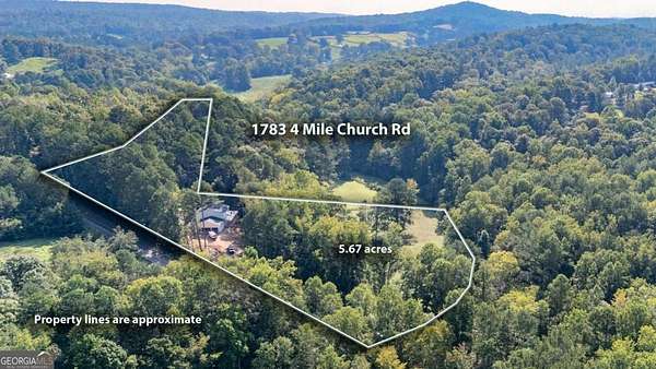 5.67 Acres of Residential Land with Home for Sale in Ball Ground, Georgia