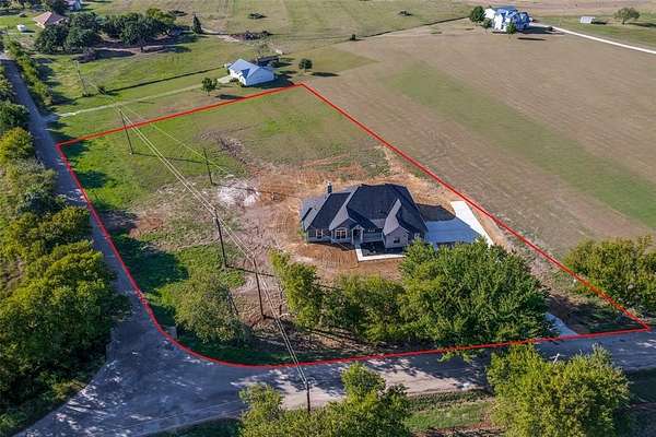 1.77 Acres of Residential Land with Home for Sale in Grandview, Texas