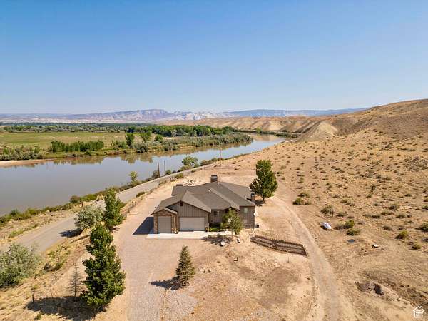 5 Acres of Residential Land with Home for Sale in Jensen, Utah