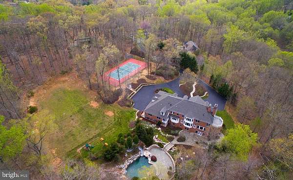 5 Acres of Residential Land with Home for Sale in Great Falls, Virginia