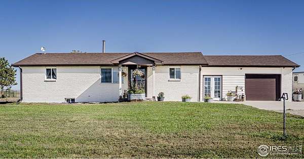 3 Acres of Residential Land with Home for Sale in Hudson, Colorado