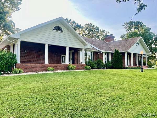 5 Acres of Residential Land with Home for Sale in Lebanon, Missouri