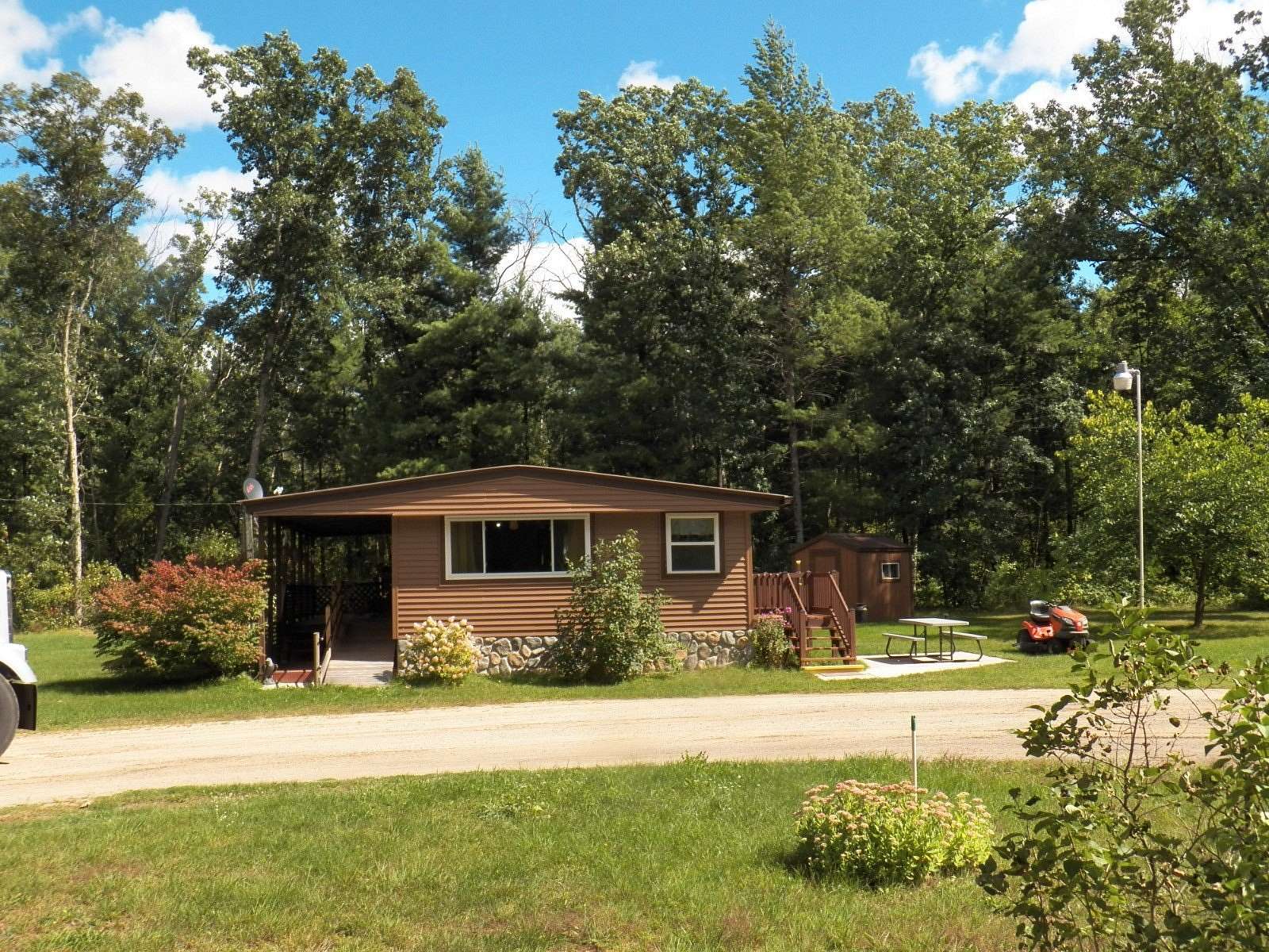 5.54 Acres of Residential Land with Home for Sale in Howard City, Michigan