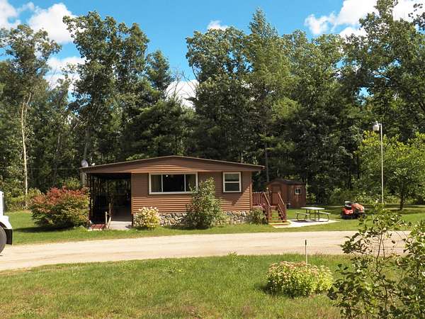 5.54 Acres of Residential Land with Home for Sale in Howard City, Michigan