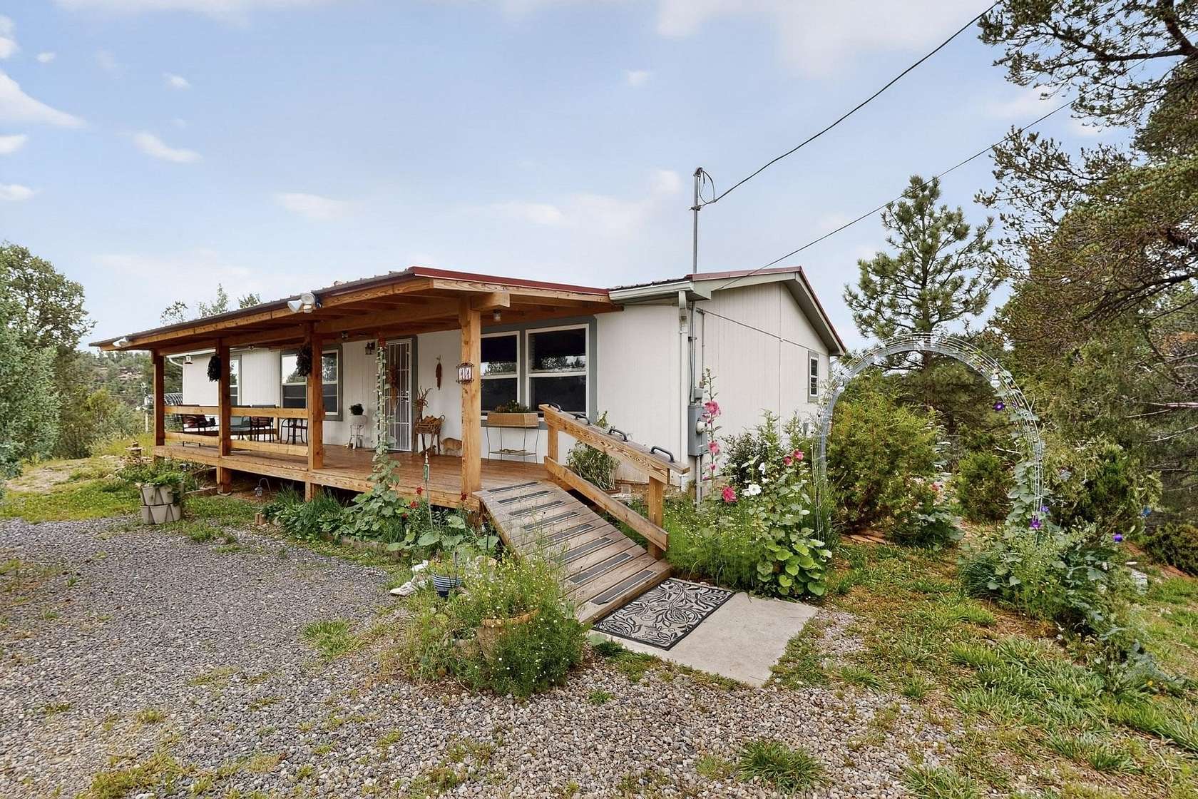 6.4 Acres of Residential Land with Home for Sale in Glorieta, New Mexico