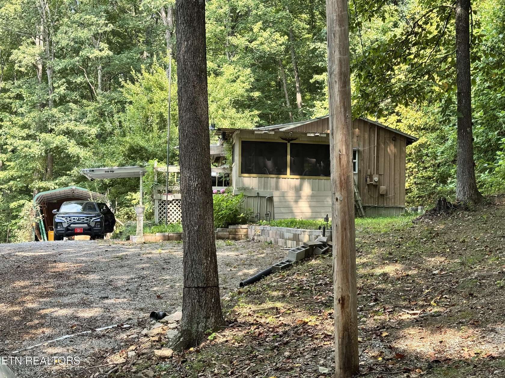 7 Acres of Land with Home for Sale in Jamestown, Tennessee