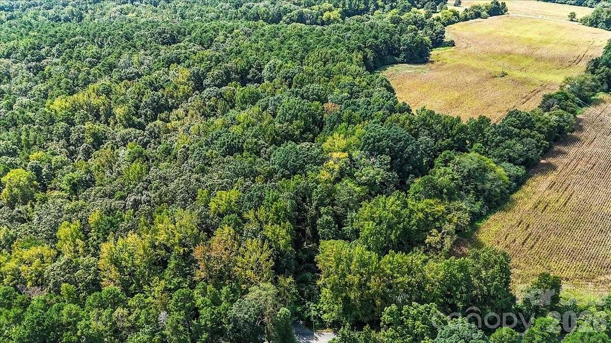 5 Acres of Land with Home for Sale in Matthews, North Carolina