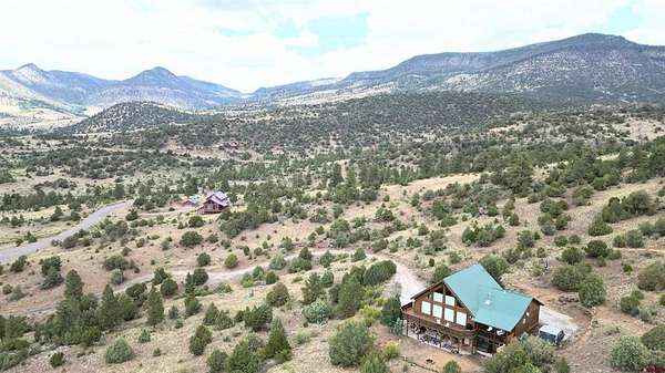 9.5 Acres of Residential Land with Home for Sale in South Fork, Colorado