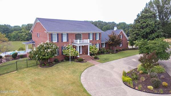 1.56 Acres of Residential Land with Home for Sale in Dyersburg, Tennessee