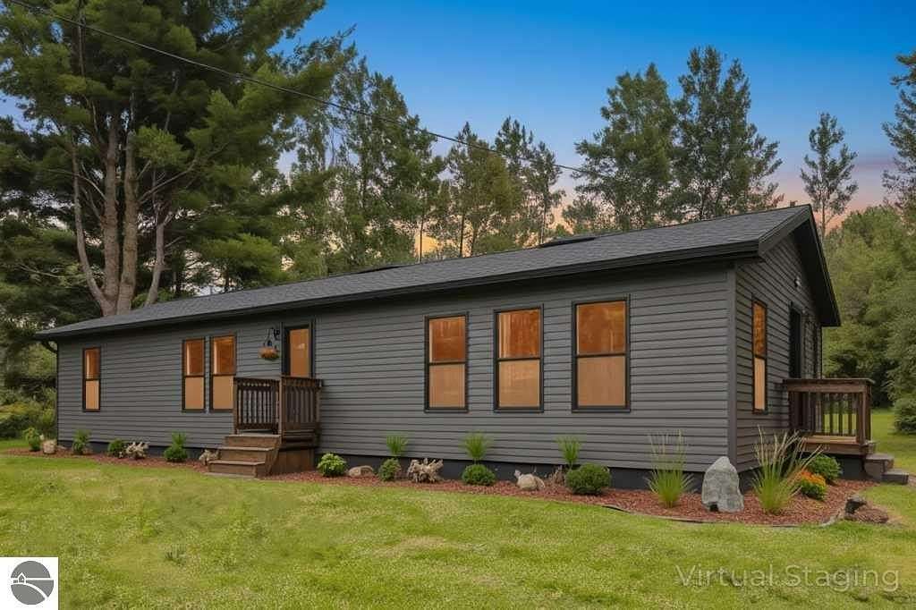 2.5 Acres of Residential Land with Home for Sale in Bellaire, Michigan