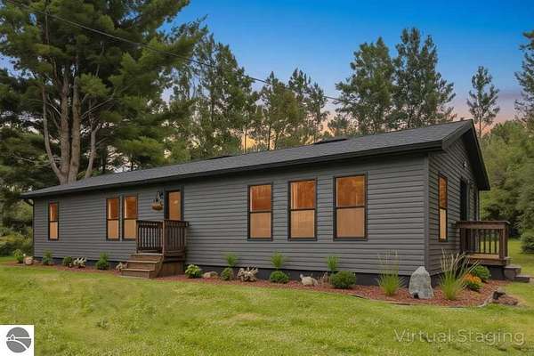 2.5 Acres of Residential Land with Home for Sale in Bellaire, Michigan