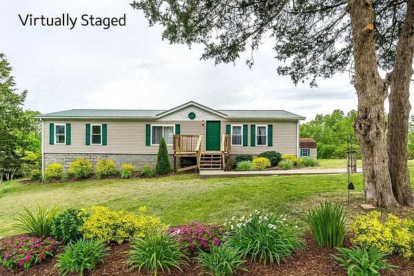 12.6 Acres of Land with Home for Sale in Sadieville, Kentucky