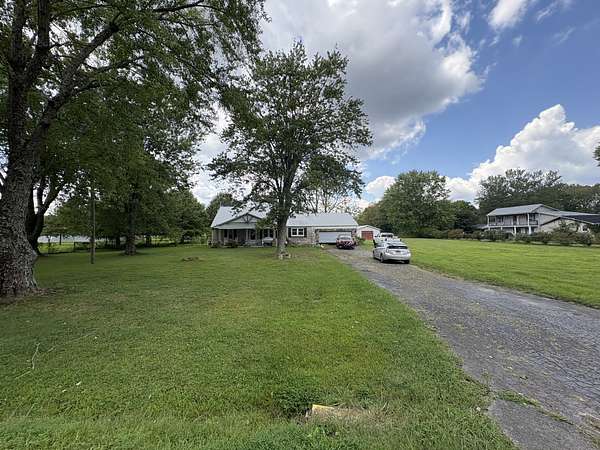 2.4 Acres of Residential Land with Home for Sale in Lawrenceburg, Tennessee