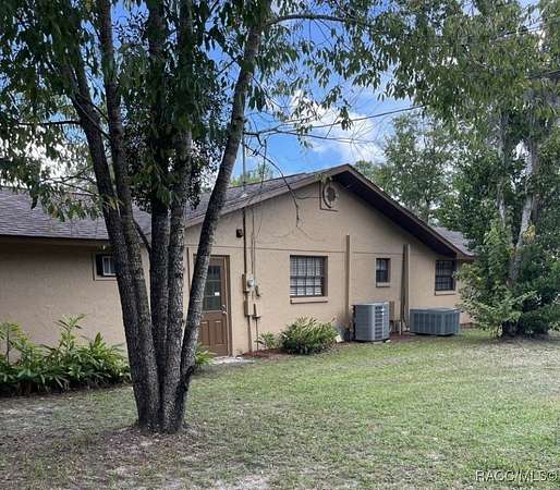 2.4 Acres of Residential Land with Home for Sale in Inverness, Florida