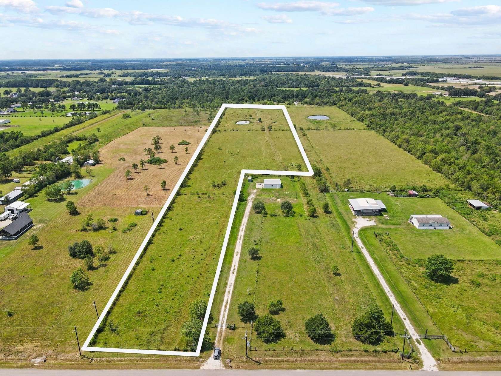 11.2 Acres of Land for Sale in Hamshire, Texas