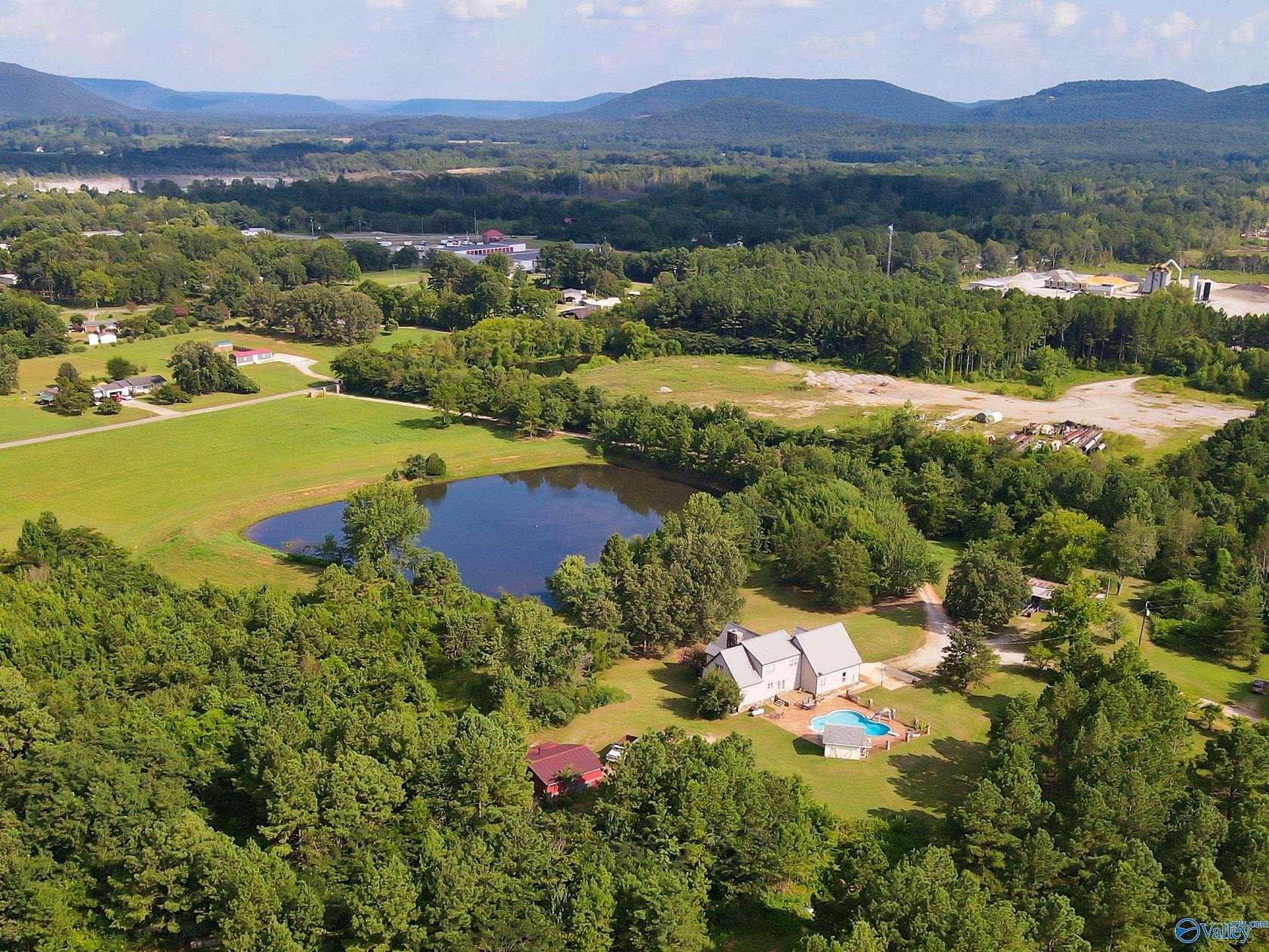 12 Acres of Land with Home for Sale in Laceys Spring, Alabama