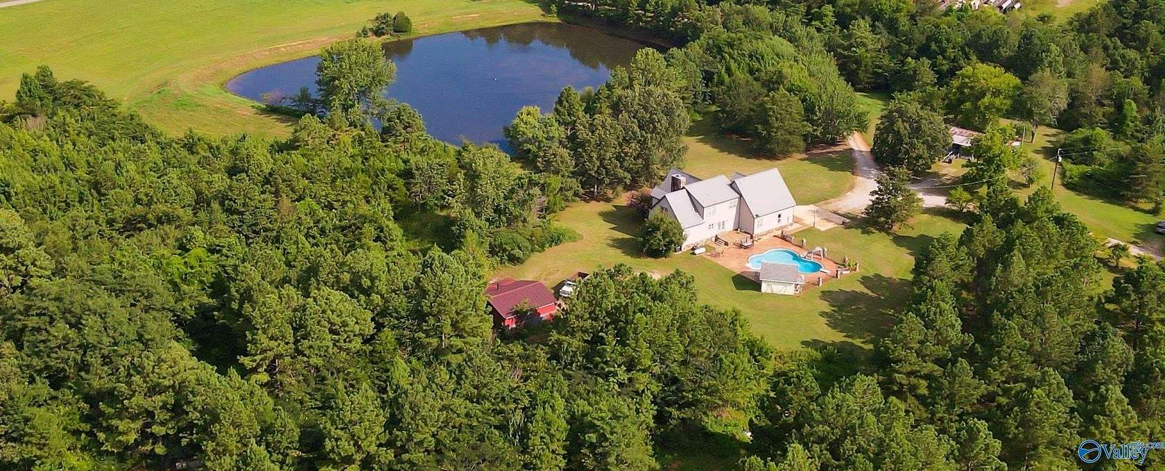 12 Acres of Land with Home for Sale in Laceys Spring, Alabama