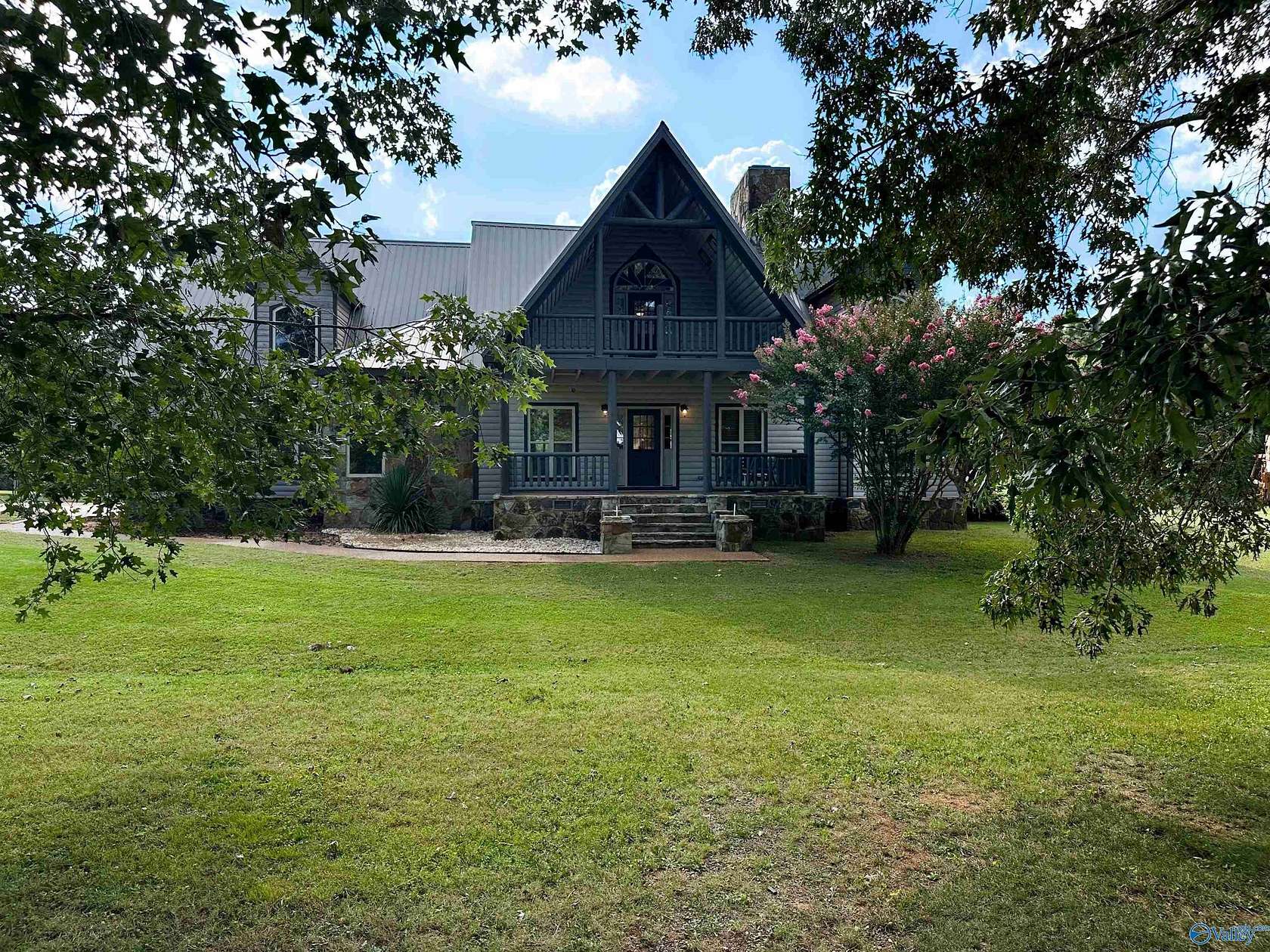 12 Acres of Land with Home for Auction in Laceys Spring, Alabama