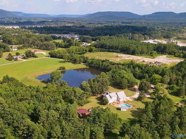 12 Acres of Land with Home for Sale in Laceys Spring, Alabama