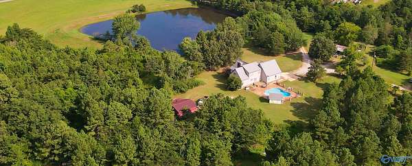 12 Acres of Land with Home for Sale in Laceys Spring, Alabama