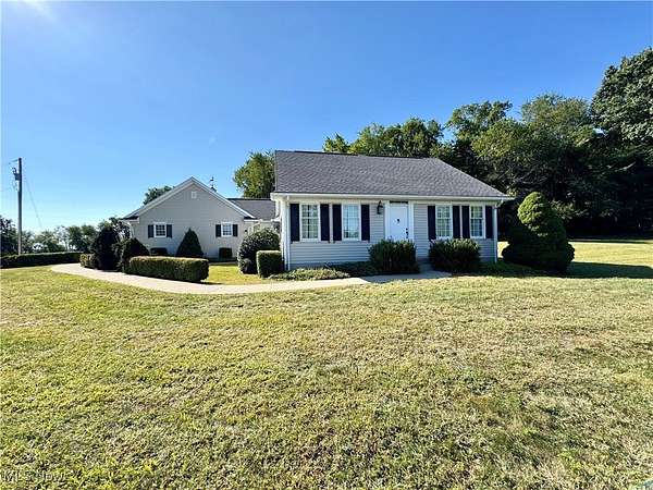 23.3 Acres of Land with Home for Sale in Bolivar, Ohio