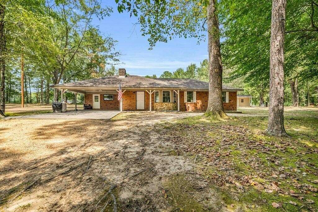 6.5 Acres of Residential Land with Home for Sale in Caledonia, Mississippi