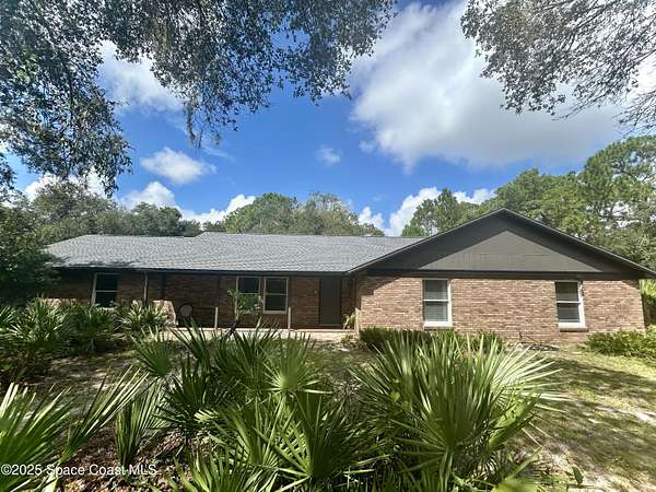 2.8 Acres of Residential Land with Home for Sale in Titusville, Florida