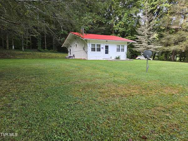 6.6 Acres of Residential Land with Home for Sale in Erwin, Tennessee